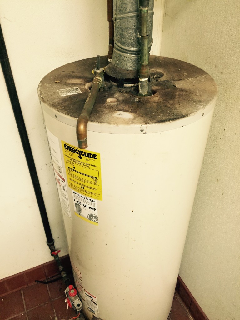Backdraft on top of water heater Water Heaters Installed by Licensed Plumber