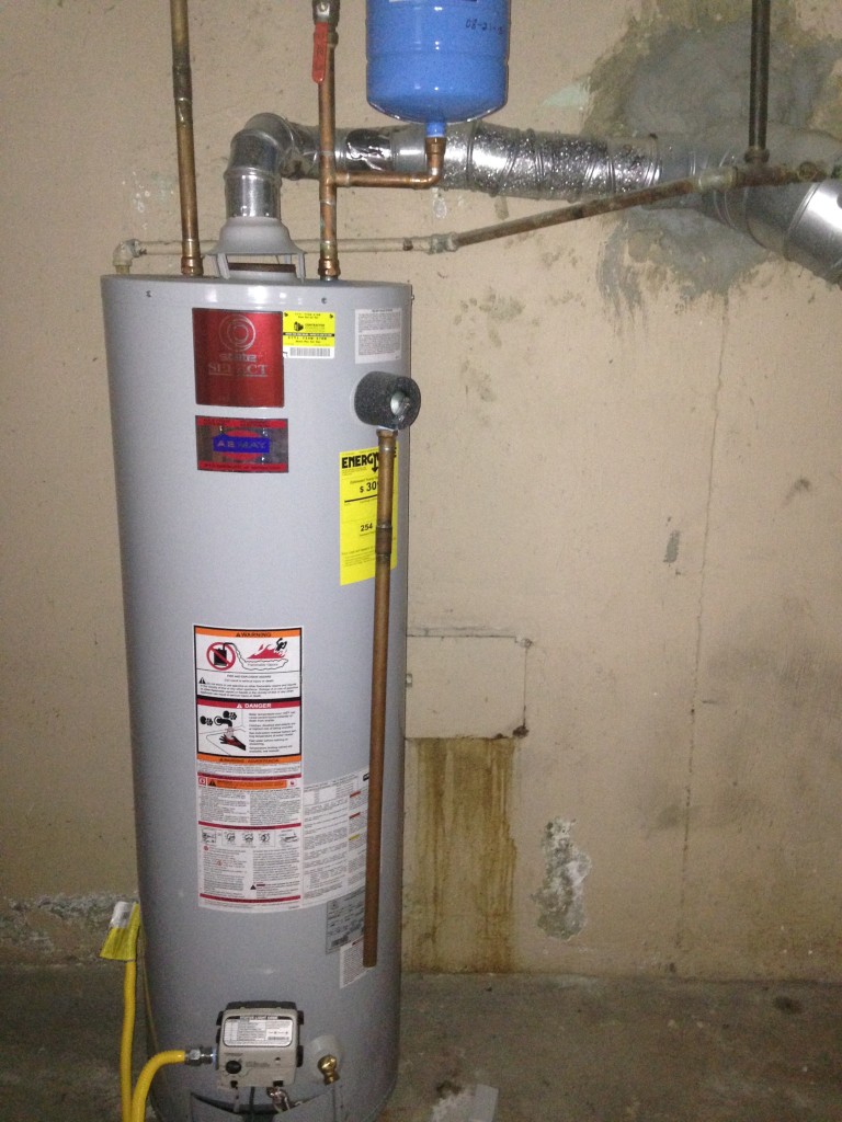 Flue for water heater sloping in wrong direction Water Heaters