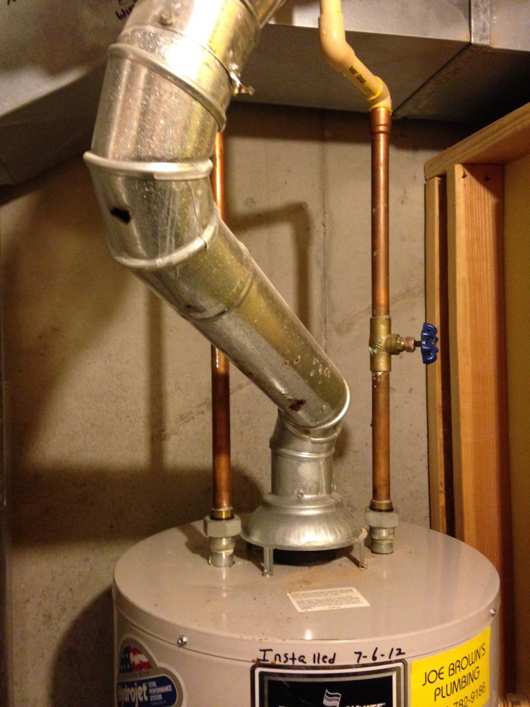 Hole in water heater flue Water Heaters Installed by Licensed Plumber