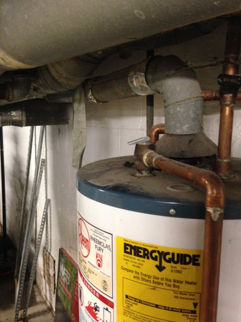 Water heater flue sloping in wrong direction Water Heaters Installed