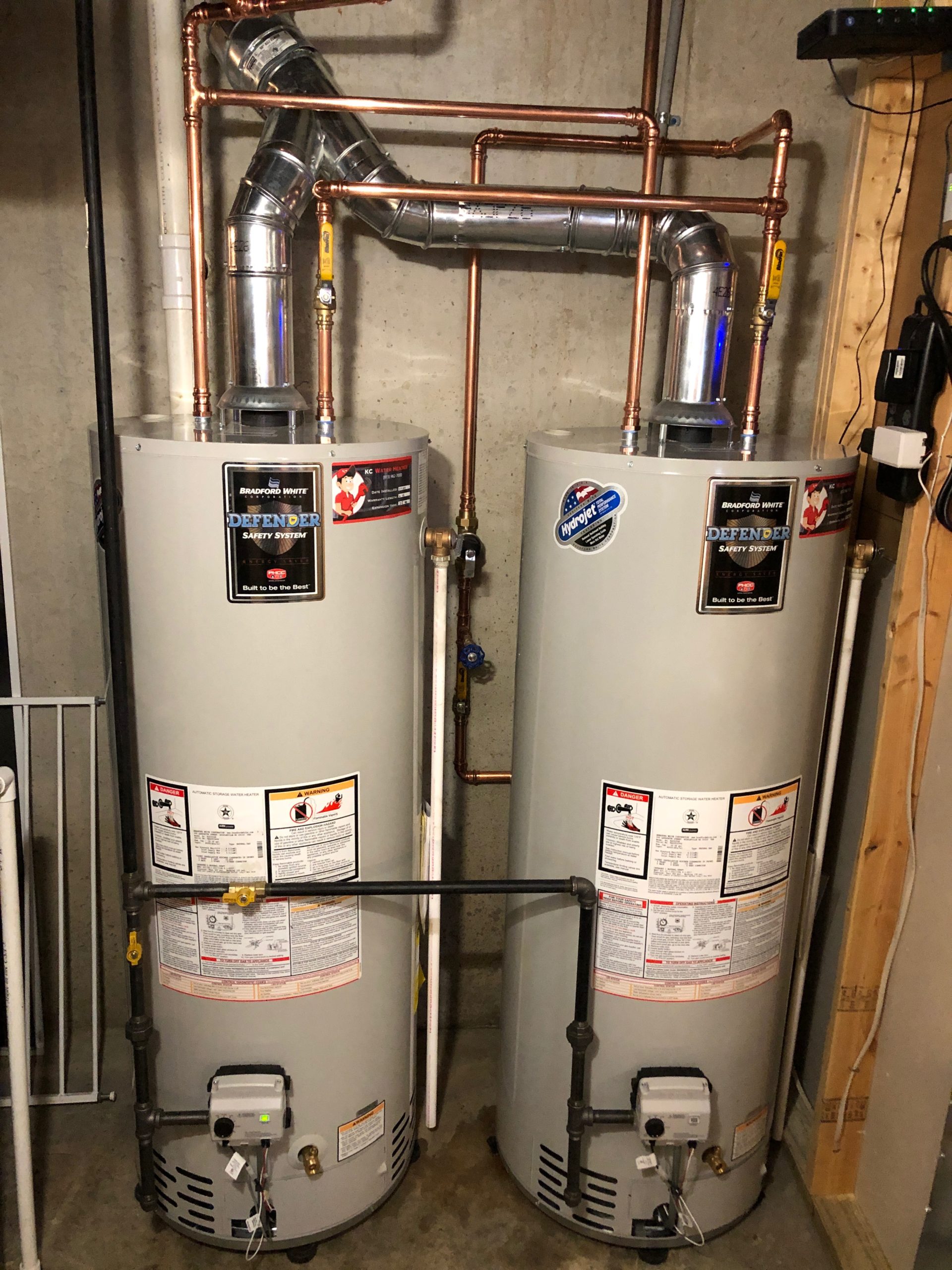 Dual water heater venting for gas tanks - Water Heaters Installed by